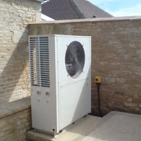Air source heat pump in a courtyard
